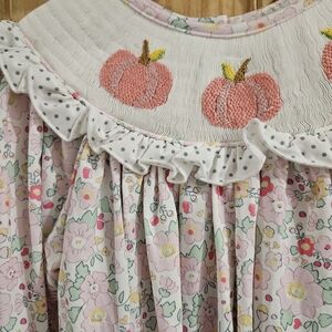Little Bear Smocked Dress with Pink Pumpkin Embroidery. With Matching Hair Bow
